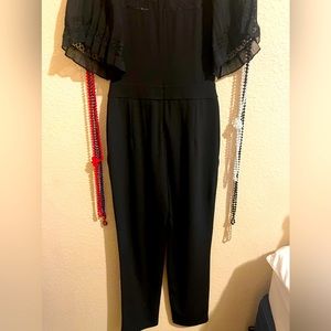 Express jumpsuit with lace with zip up in back and front pockets